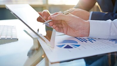 Business person using tablet