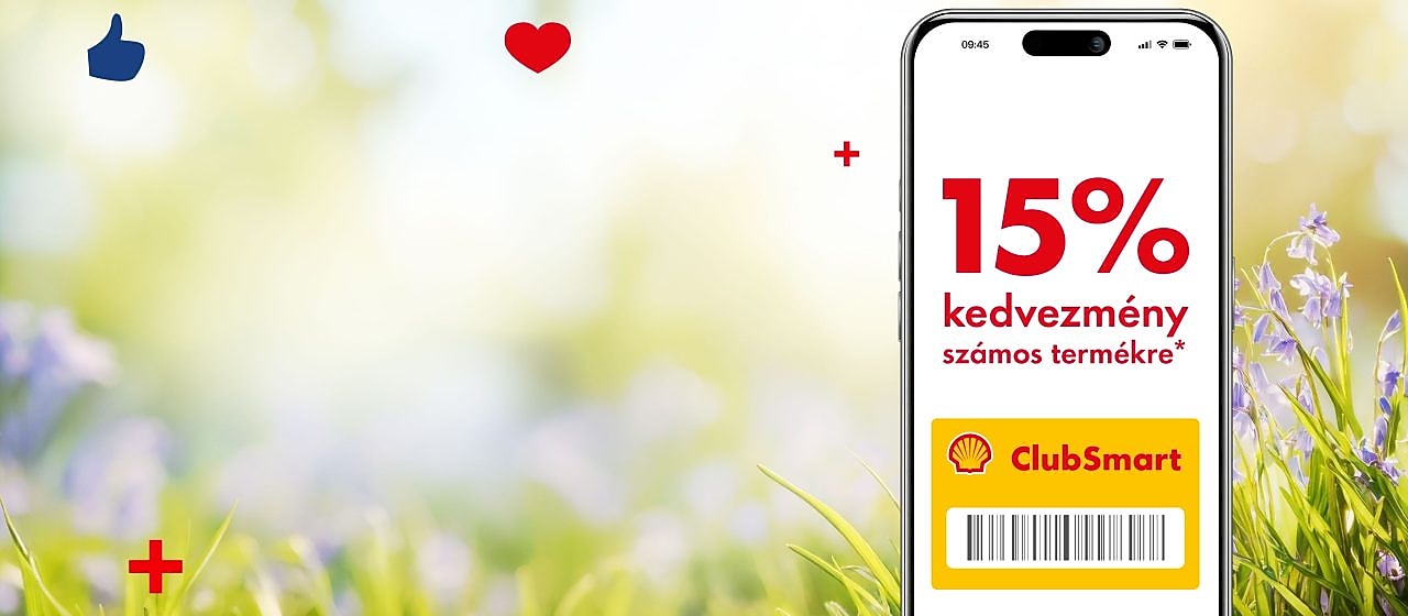 Kellemes tavaszi háttér előtt egy falapon egy mobiltelefon jelenik meg,  melynek Shell Appos kijelzőjén a 15%-os kedvezményes ajánlat olvasható.